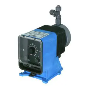 Pulsafeeder Pulsatron Series E Plus diaphragm pump left front angle showing blue mounting base, gray control housing with clear protective cover, and ribbed pump head. Industrial chemical metering pump with top-mounted check valve and manual stroke rate and length controls. Versatile positive displacement pump with 4-20mA control capability and flow capacities to 600 gpd for demanding industrial applications.